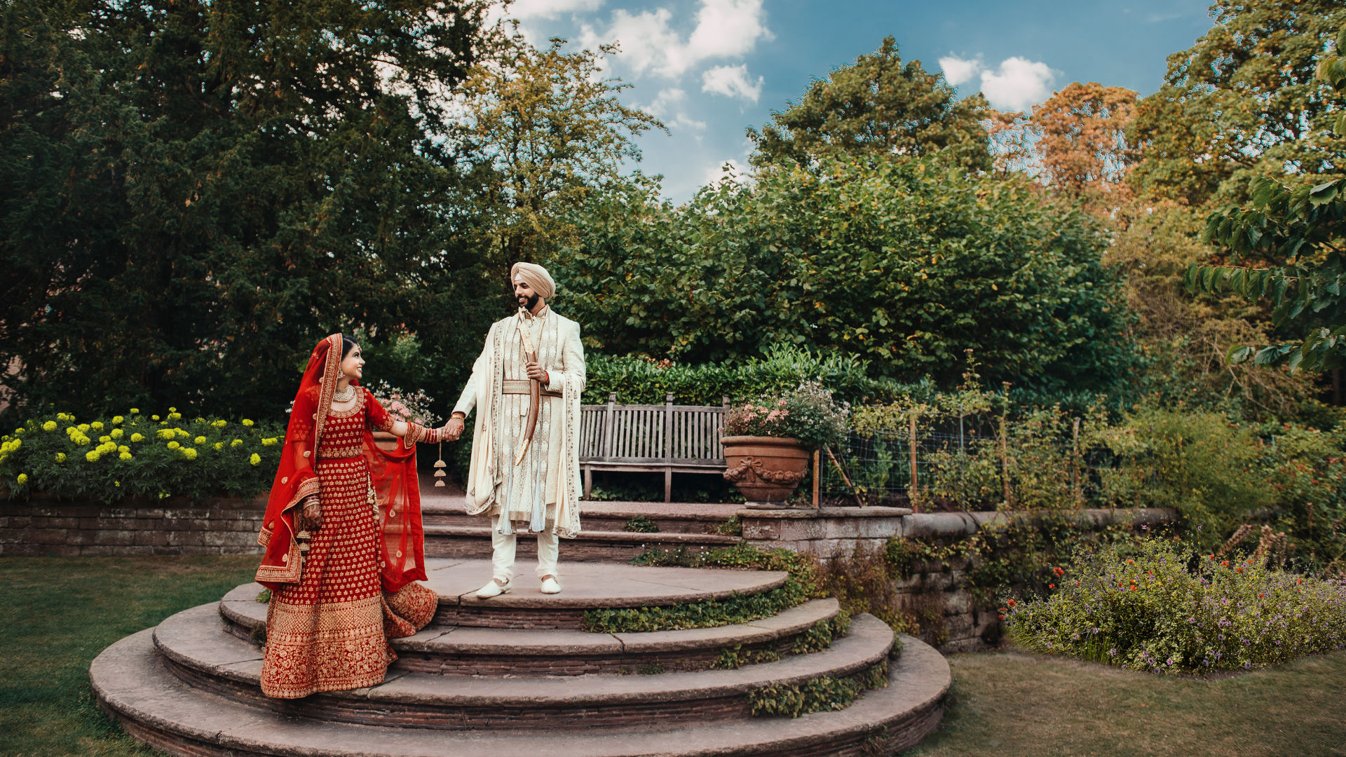 Sisters hold a groom's palla before the barrat in Coventry.
